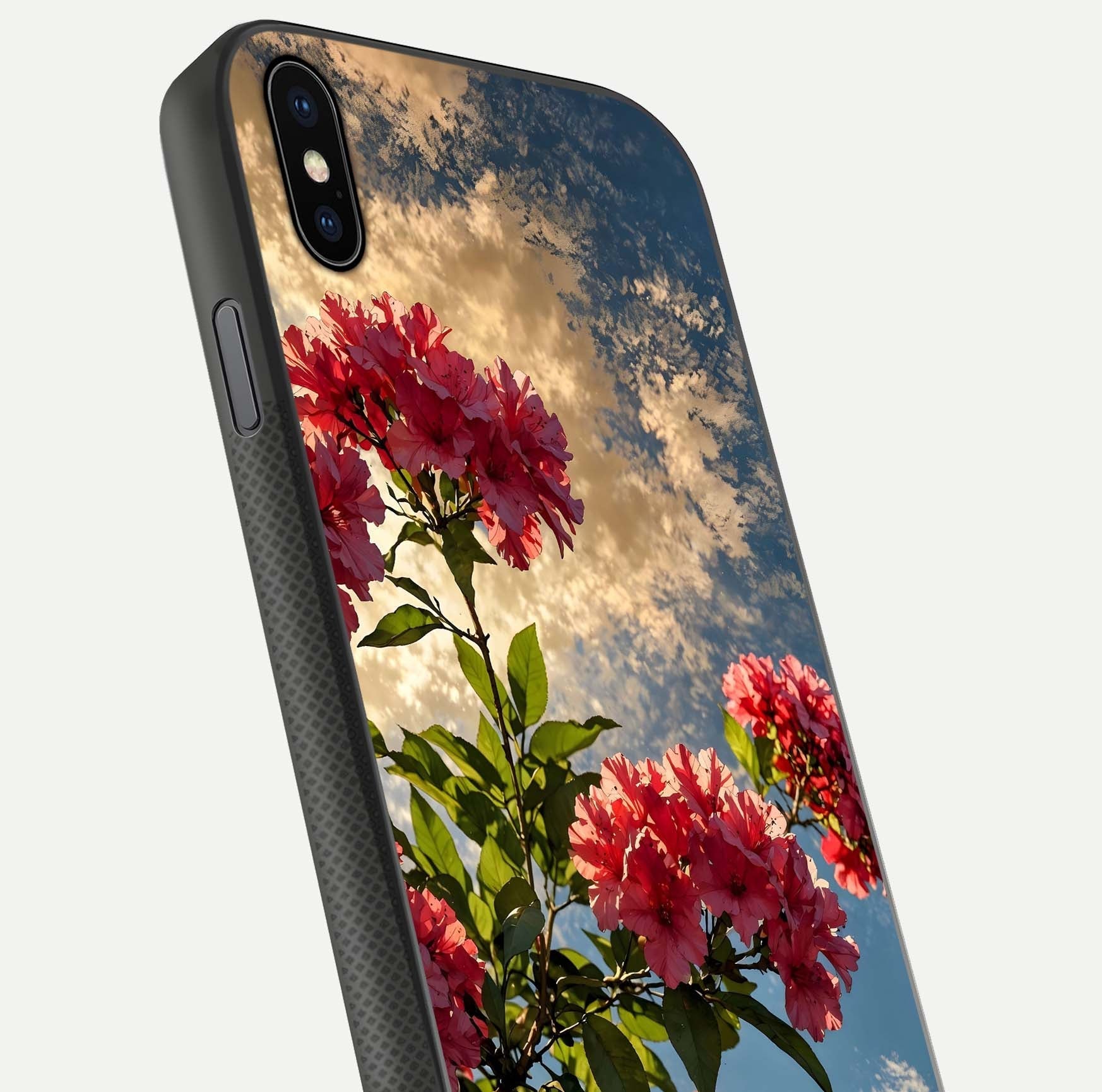 Red Bloom Skies Glass Case for iPhone Xs close-up angled shot highlighting detailed blooms and reflection