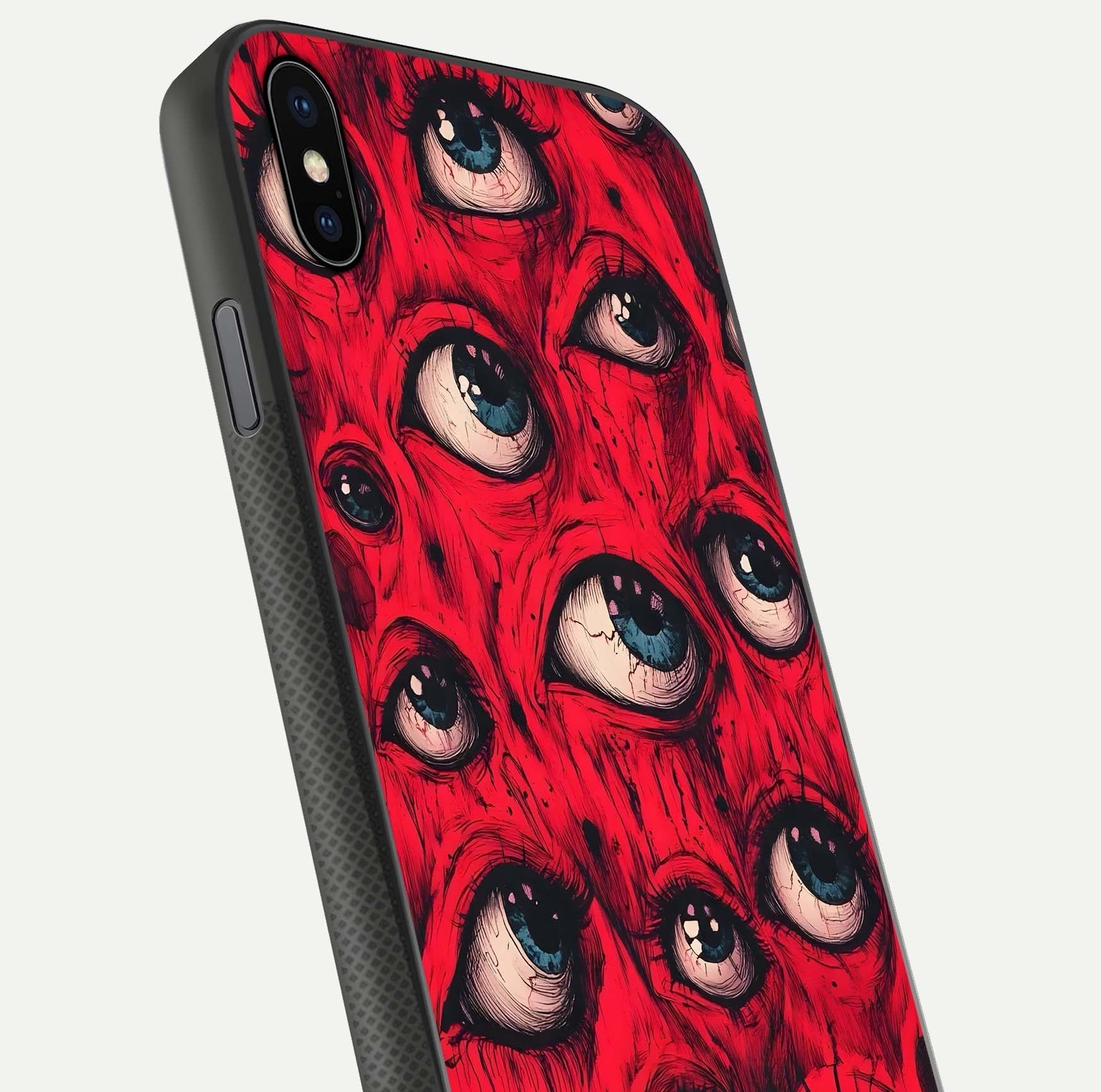 Red Eyes Pattern Glass Case for iPhone Xs close-up angled shot highlighting vivid contrast and HD shine