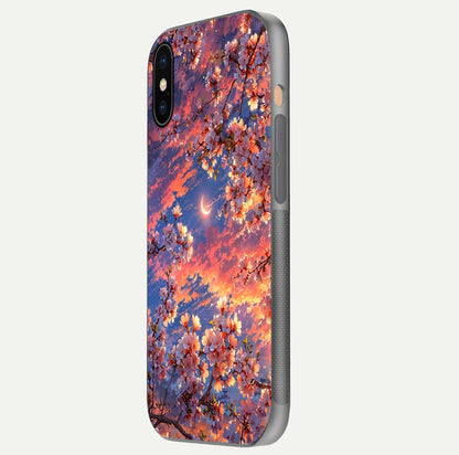 Celestial Sakura Sunset Glass Case for iPhone Xs side-angle image showing edge glow and petal texture