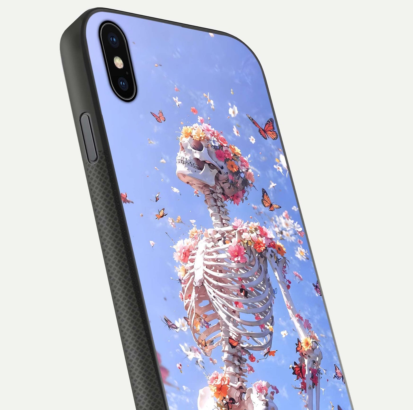 Bloom Beyond Bones Glass Case for iPhone Xs Max close-up highlighting unique bone-floral fusion art and reflection